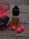 Die pinken Fluo Pop Ups werden mit einem Trigga Shot geliefert, der neben Aminosäuren, Betain und vielen weiteren Attraktoren noch das Flavour Deiner Wahl enthält. Fängiger geht es kaum...